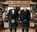 A comparative view of two kilt outfits on mannequins in a traditional tailor shop. On the left, a formal Prince Charlie jacket with tails and bow tie. On the right, a versatile Argyll jacket with a long tie. A sign above asks, "Which kilt jacket should you choose?"